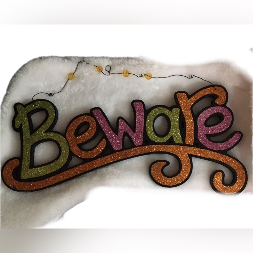 Colorful Glitter 'Beware' Sign